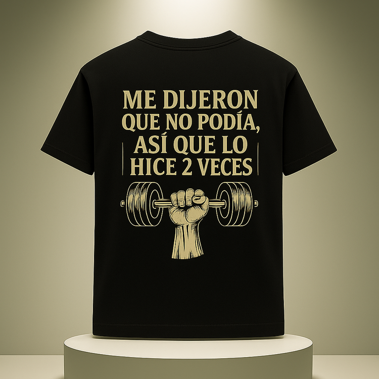 Black t-shirt with motivational text and graphic on a beige background