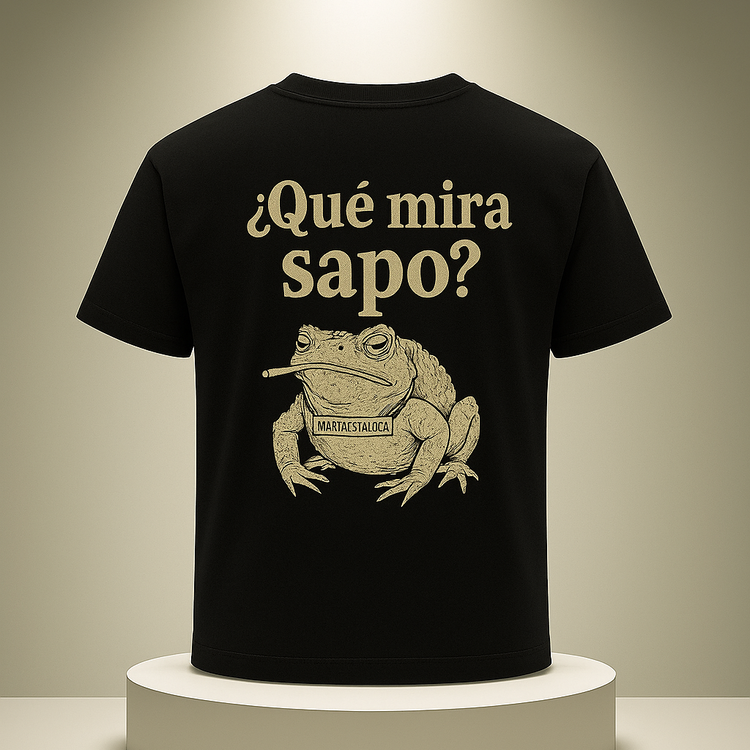 Black t-shirt with a frog graphic and text on a beige background