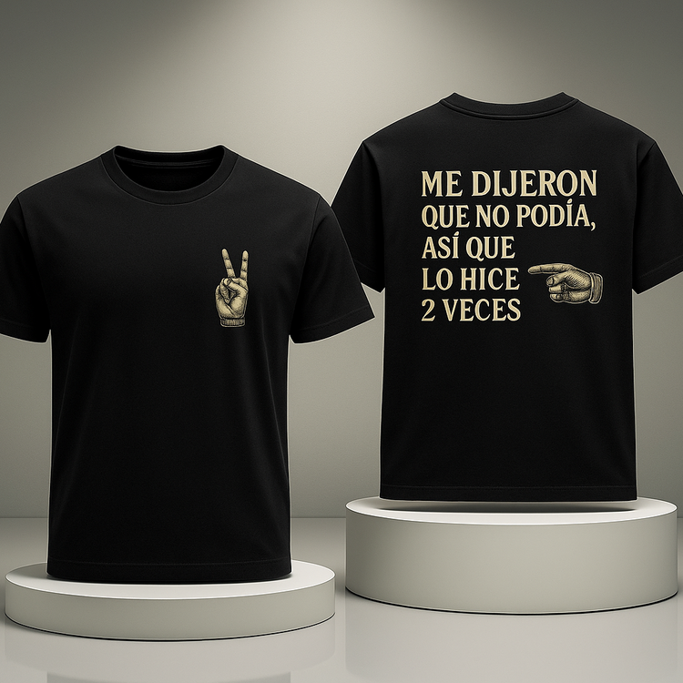 Black t-shirt with text and graphic design on a gray background