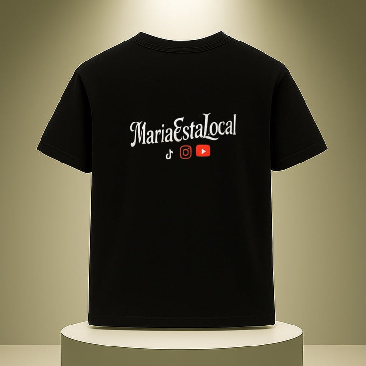 Black t-shirt with 'MariaEstaLocal' text on a round platform against a beige background
